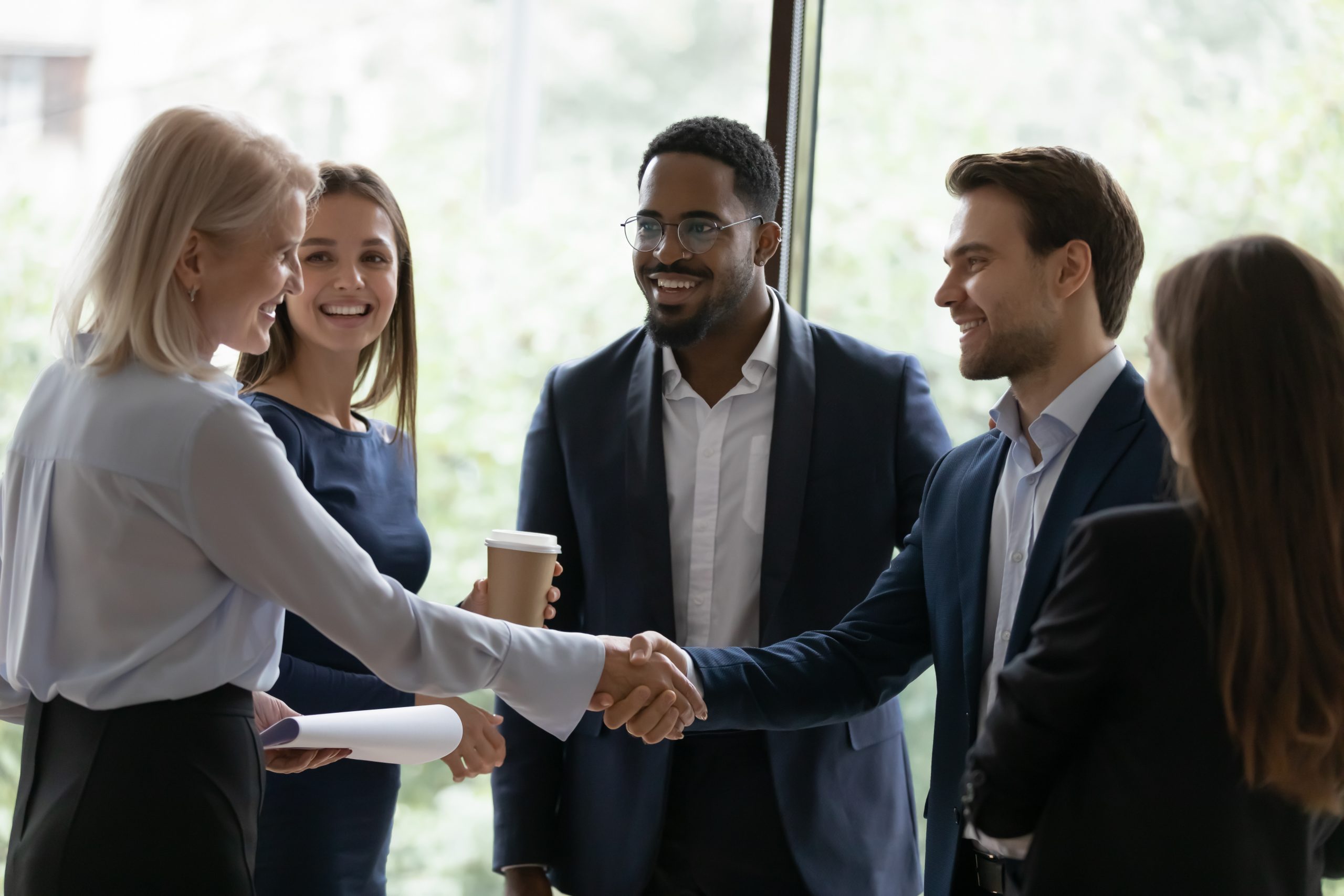 a group of people shaking hands